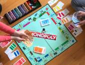 People playing Monopoly