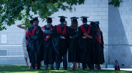 A group of Graduating students having their photo taken