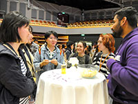 people enjoying food on the table