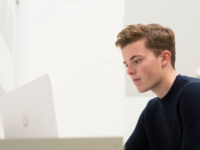 male student sitting