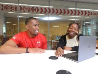 Two students in the Library