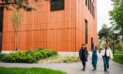 FAB building with students walking in front