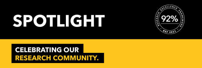 A decorative email header in yellow and black with the title SPOTLIGHT and tagline Celebrating our Research Community